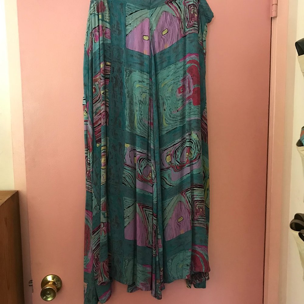 Long Skirt Turquoise Background with Multi-Colored Modern Design